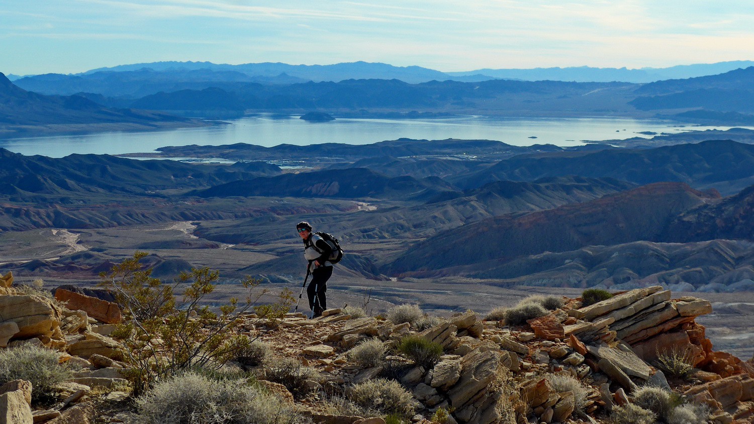 Marion on the final ridge of Anniversary Peak with Lake Mead in th background